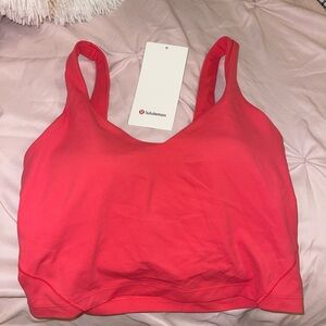Lululemon Align Tank
Fits A/B cup
Tight fit, cropped length
Removable pads